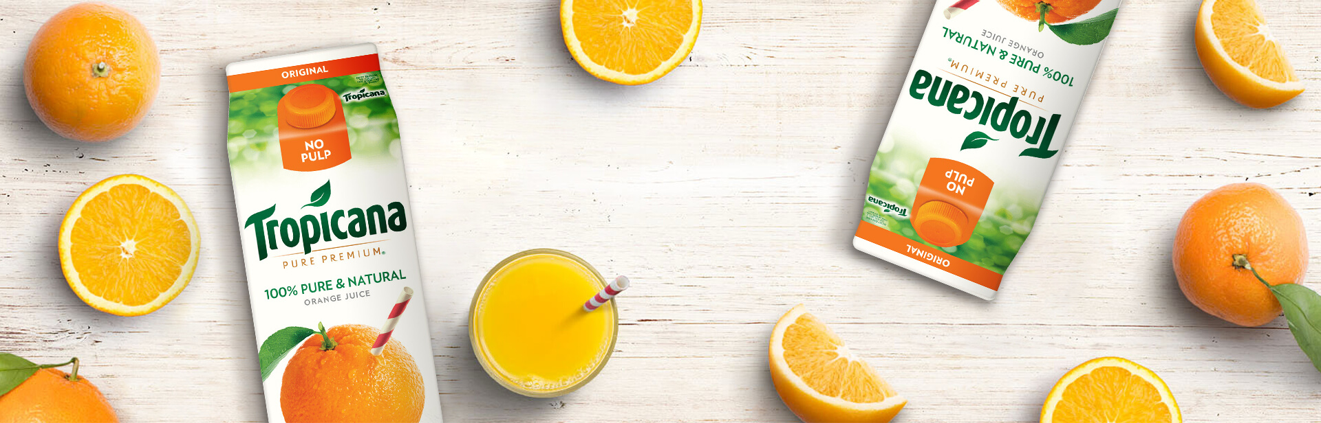 Oranges, juice and Tropicana bottles